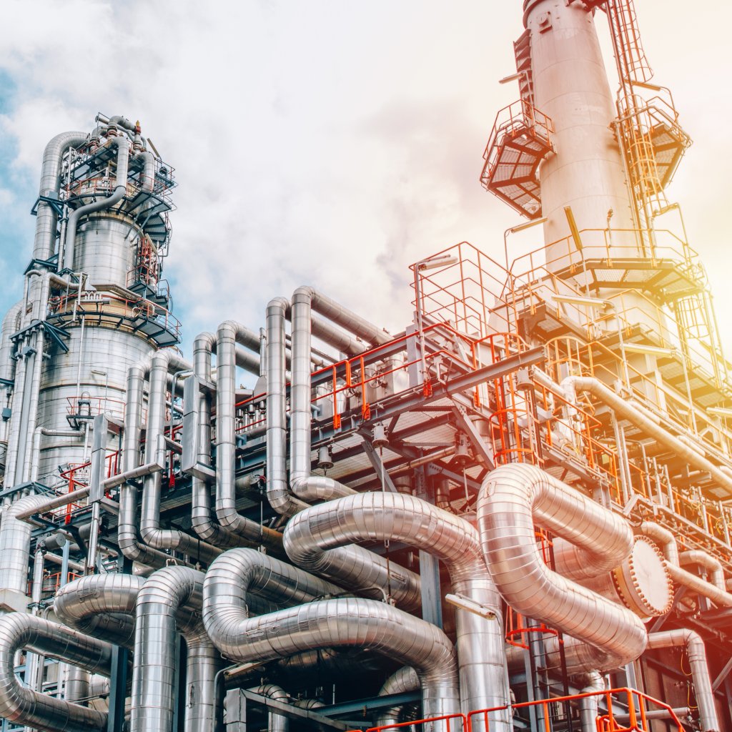 Industrial zone,The equipment of oil refining,Close-up of industrial pipelines of an oil-refinery plant,Detail of oil pipeline with valves in large oil refinery.